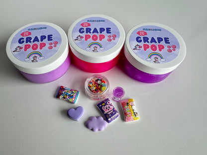 Jelly cube pink and purple slime. Perfect to squish, stretch and pop.