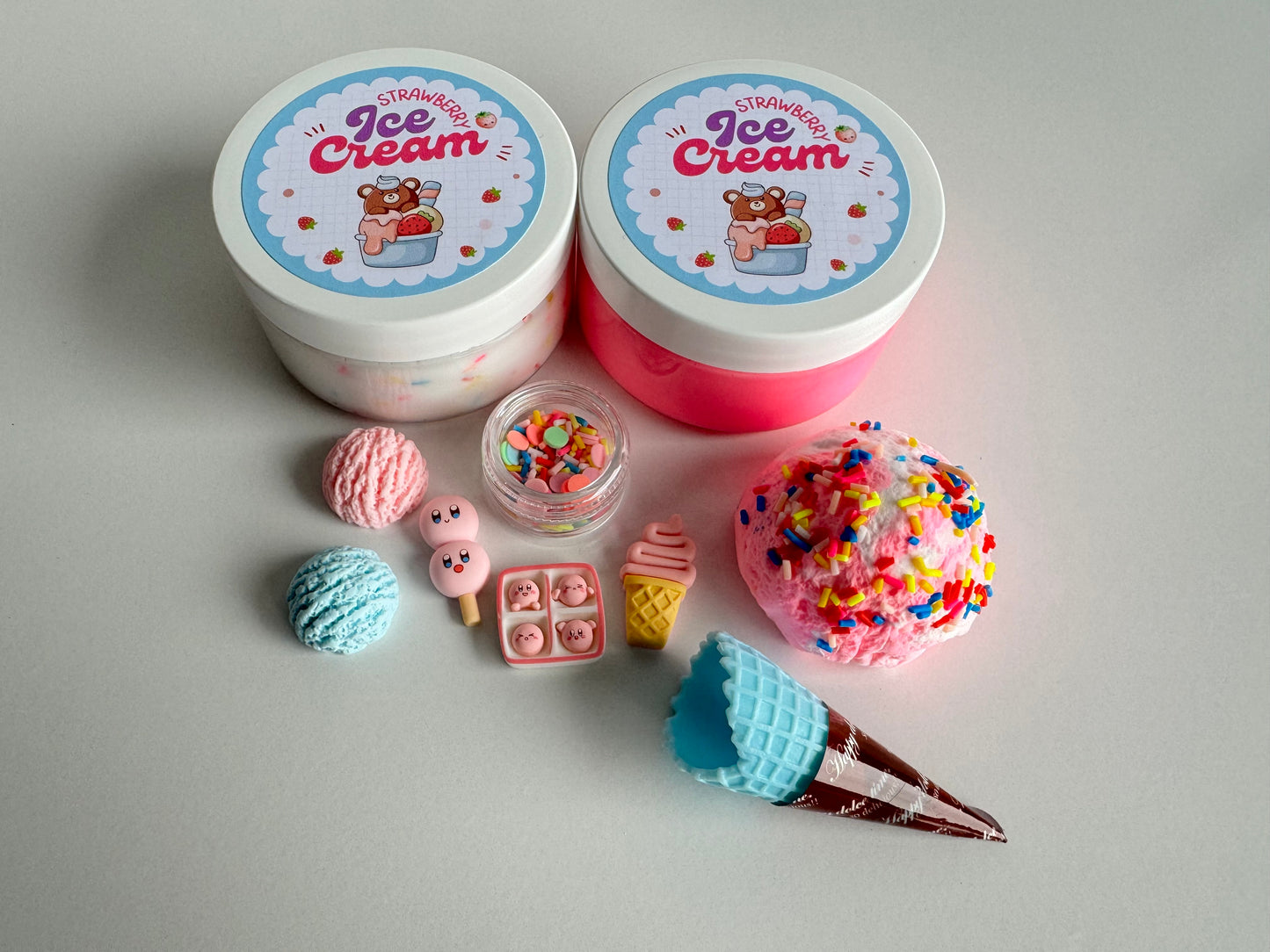 Handmade Ice Cream Land Slime Kit with creamy textures and sweet dessert accessories to squish into your slime 