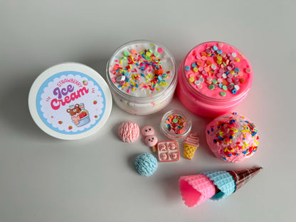 Our delicious strawberry ice cream slime kit. White slime filled with sprinkles and a pink slime. Ice cream scoop clay piece with accessories 